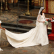 Maid of Honour, Pippa Middleton (L) holds the wedding dress of her sister Catherine, Duchess of Cambridge, after her she married Britain's Prince William at Westminster Abbey, in central London April 29, 2011. Prince William married his fiancee, Kate Middleton, in Westminster Abbey on Friday. (ROYAL WEDDING/SERVICE) RREUTERS/Kirsty Wigglesworth/Pool (BRITAIN - Tags: ENTERTAINMENT SOCIETY ROYALS) - LR2E74T172DAA